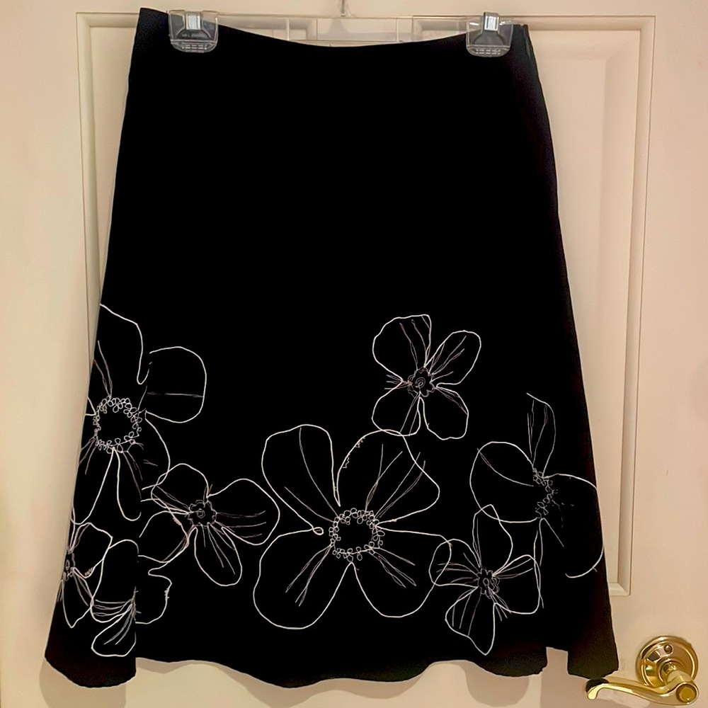 Black full skirt embroidered white flowers